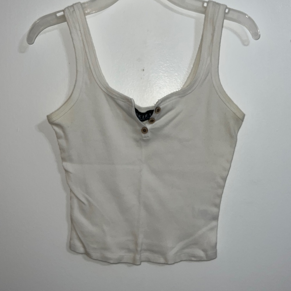 AKIRA, size small, white, with buttons that don’t button up